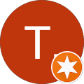 T.